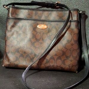 Brown and black leather crossbody Coach purse